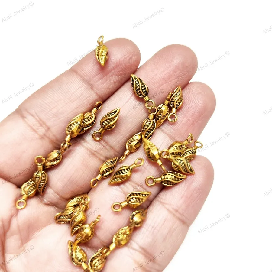 Antique golden twisted leaf metal dangles jhumki 12 x 4 mm dangle charms latkan metal beads GSDB05 10 gm