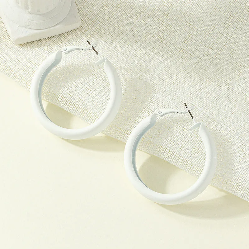 Korean-inspired Exaggerated Painted Circle Earrings with Sleek Design